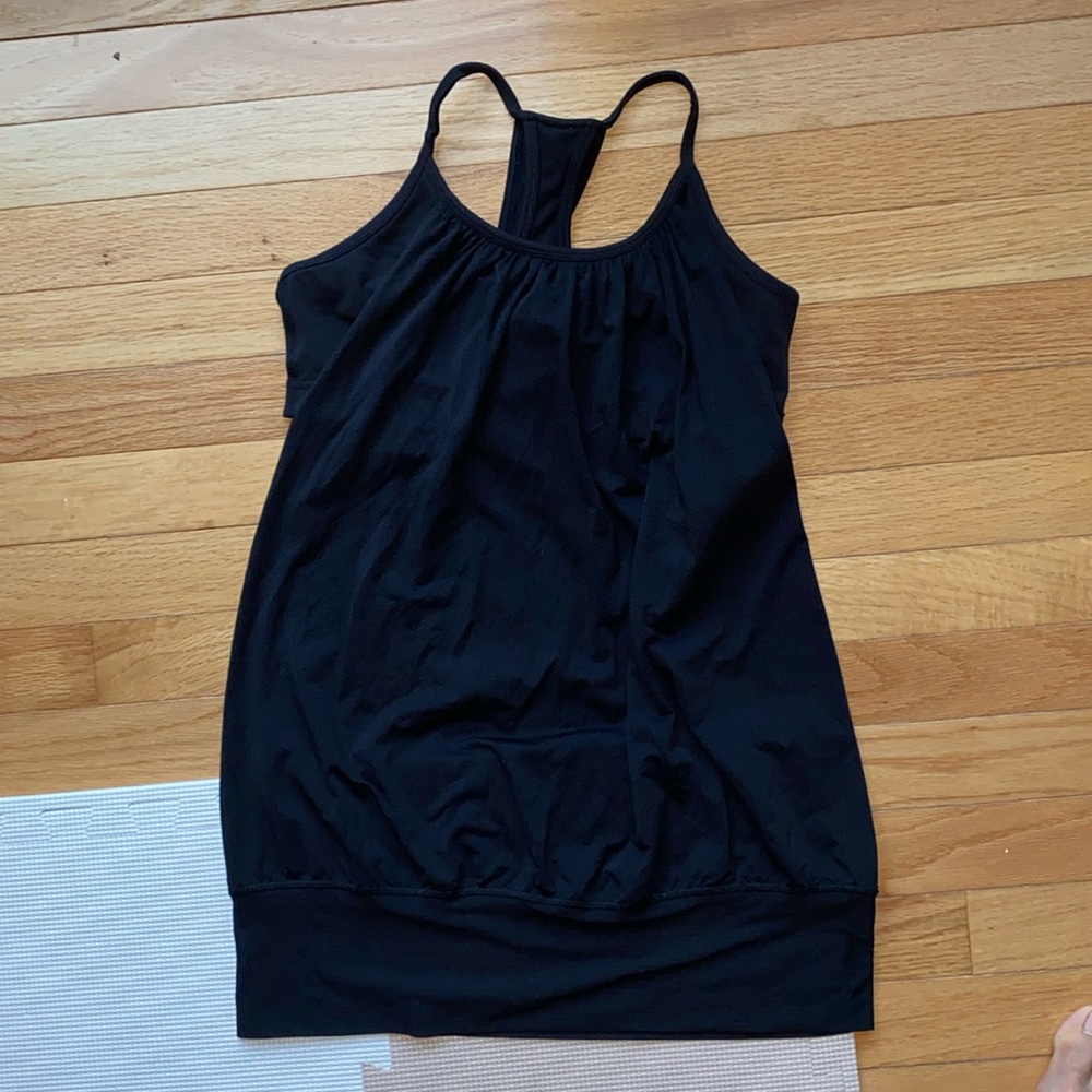Black lululemon tank top with built in shorts bra.
